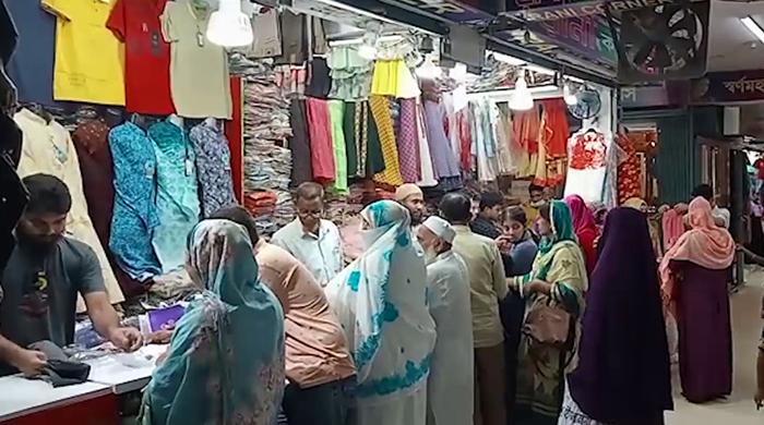 গোবিন্দগঞ্জে ক্রেতাদের নজর তৈরি কাপড়ের দোকানে, ঈদে কাজের চাপ নেই দর্জি দোকান ও টেইলার্সে গোবিন্দগঞ্জে ক্রেতাদের নজর তৈরি কাপড়ের দোকানে, ঈদে কাজের চাপ নেই দর্জি দোকান ও টেইলার্সে