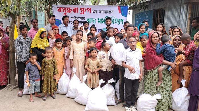 গাইবান্ধায় বুদ্ধি প্রতিবন্ধী শিশুদের মাঝে খাদ্য সামগ্রী বিতরণ গাইবান্ধায় বুদ্ধি প্রতিবন্ধী শিশুদের মাঝে খাদ্য সামগ্রী বিতরণ