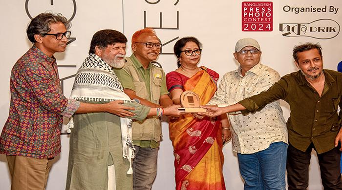 বাংলাদেশ প্রেস ফটো কনটেস্টে বর্ষসেরা আলোকচিত্রী পুরস্কার পেলেন কুদ্দুস আলম